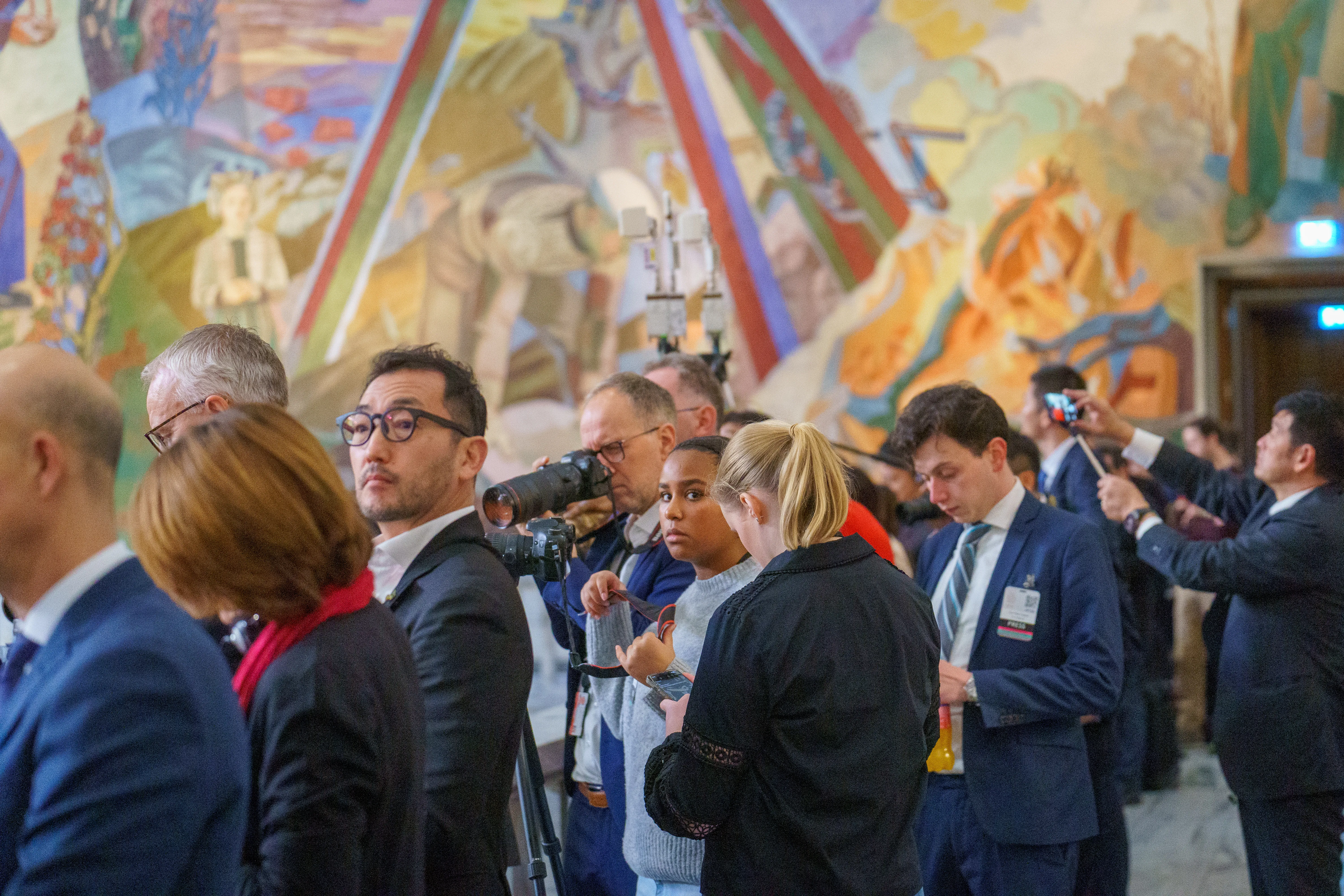 Journalists and photographers inside Oslo City Hall during the 2024 Nobel Peace Prize Ceremony